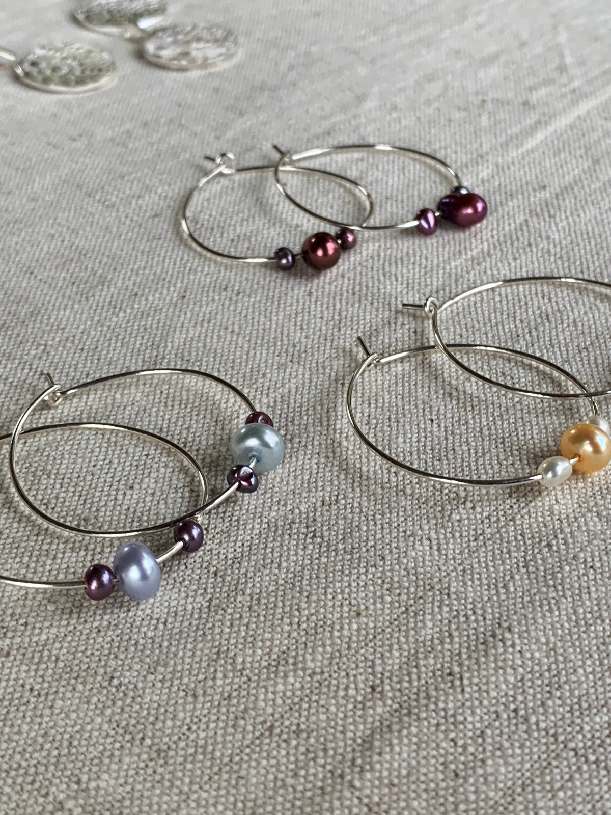 Earrings I Ear Adornment Sterling silver hoops with pearls featured